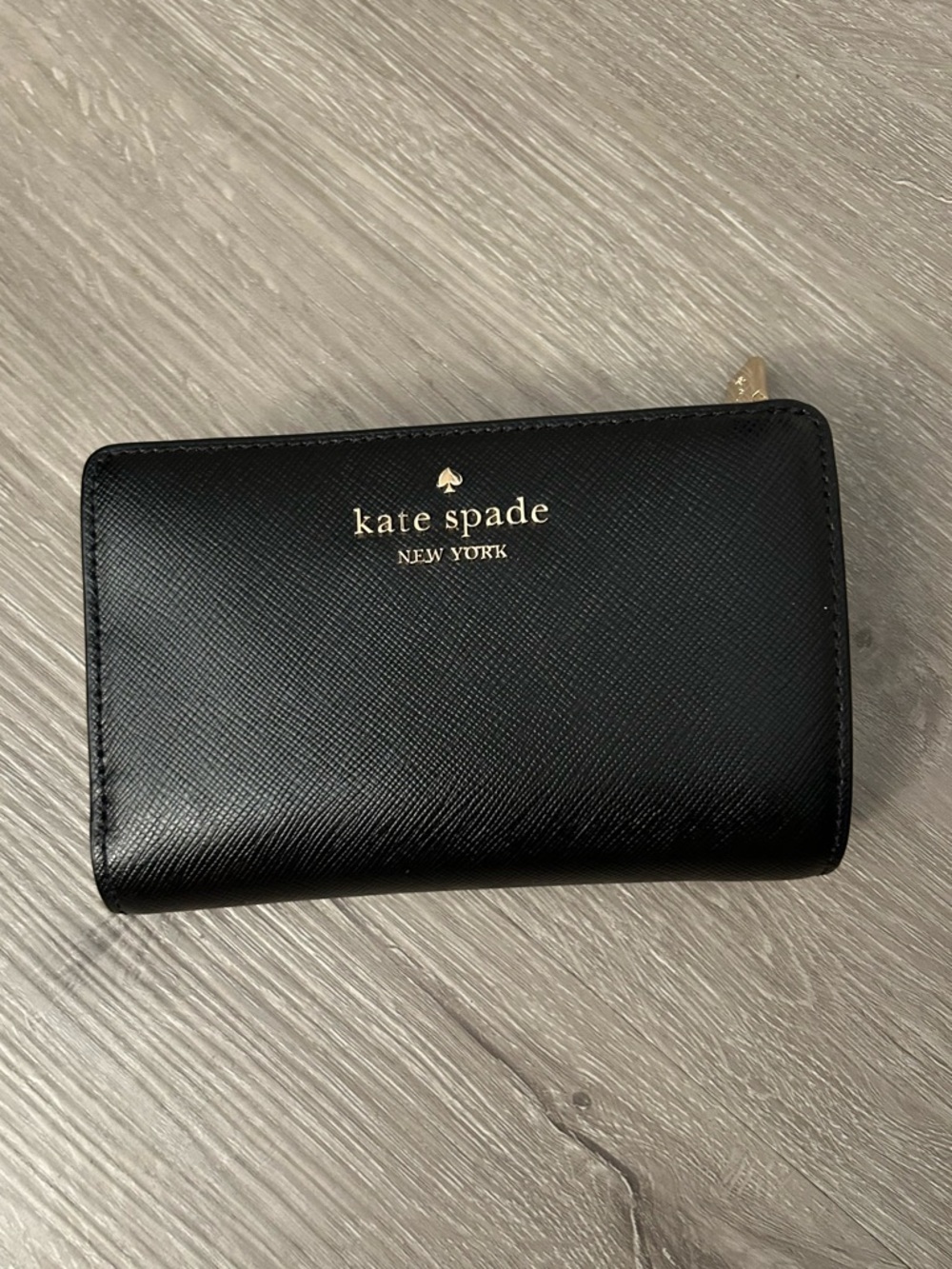 kate spade medium sized Black Leather Zip Around Card Wallet with Gold Logo